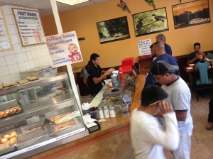 Customers line up for lunch at Guti'z Bakery in East Haven. (Jeff Cohen/WNPR/